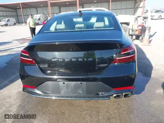 2022 Genesis G70 2.0T with VIN KMTG34TA0NU098580, listed as a IAAI auction lot 41763511 with 87,816 mi miles. Bid and sale history available at carsss.com. Image 16.