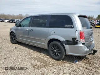 2014 Dodge Grand Caravan SXT with VIN 2C4RDGCG4ER114464, listed as a Copart auction lot 52480965 with 125,212 mi miles and Salvage Title. Bid and sale history available at DreamBid. Image 2.