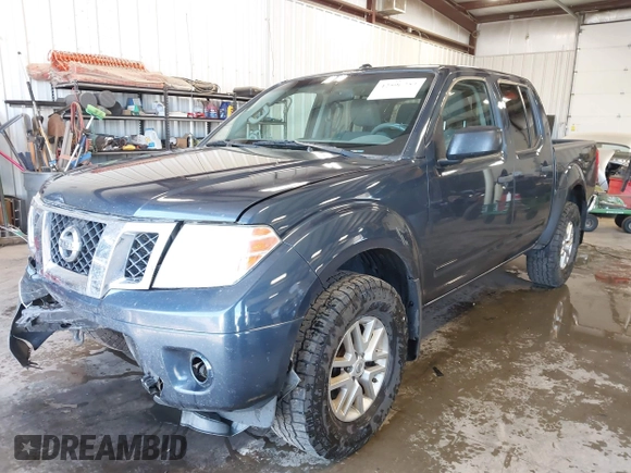 2015 Nissan Frontier Pro-4X with VIN 1N6AD0EV6FN735426, listed as a IAAI auction lot 42596253 with 183,493 mi miles and . Bid and sale history available at DreamBid. Image 18.