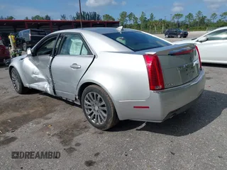 2012 Cadillac CTS with VIN 1G6DM5E37C0126305, listed as a IAAI auction lot 42001466 with 150,566 mi miles and . Bid and sale history available at DreamBid. Image 3.