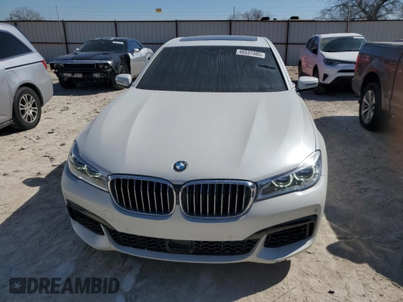 2019 BMW 7 Series 750i with VIN WBA7F0C5XKGM25348, listed as a Copart auction lot 46537485 with 54,365 mi miles and Salvage title. Bid and sale history available at DreamBid. Image 5.