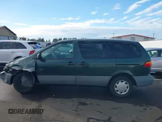 2000 Toyota Sienna CE with VIN 4T3ZF19C6YU220808, listed as a IAAI auction lot 41250496 with 222,812 mi miles. Bid and sale history available at carsss.com. Image 14.