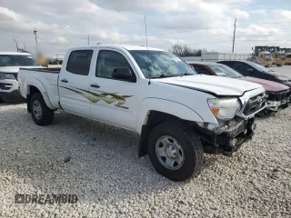 2014 Toyota Tacoma PreRunner with VIN 3TMKU4HN7EM040312, listed as a Copart auction lot 87420864 with 68,853 mi miles and Salvage title. Bid and sale history available at DreamBid. Image 4.