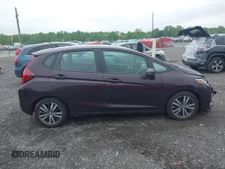 2015 Honda Fit EX-L z VIN 3HGGK5H81FM757562, wystawiony jako IAAI lot #42177050 z przebiegiem 217 618 mil mil oraz . Historia ofert i sprzedaży dostępna na DreamBid. Obrazek 13.