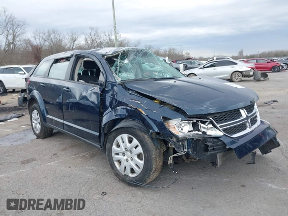 2013 Dodge Journey SE z VIN 3C4PDCAB7DT701180, wystawiony jako IAAI lot #41609700 z przebiegiem 118 207 mil mil oraz . Historia ofert i sprzedaży dostępna na DreamBid. Obrazek 1.