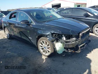 2017 Ford Fusion Energi SE with VIN 3FA6P0PU4HR183628, listed as a IAAI auction lot 41521242 with 143,219 mi miles. Bid and sale history available at carsss.com. Image 1.