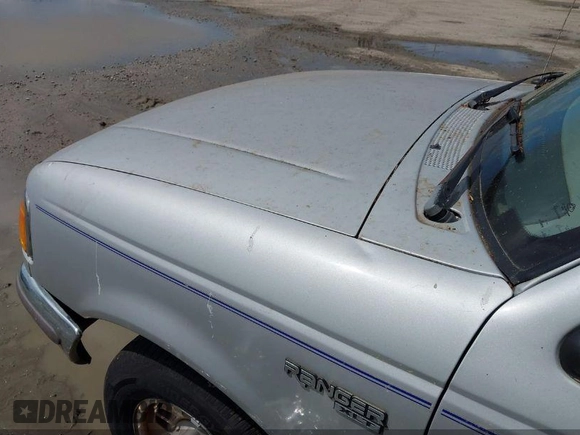 1997 Ford Ranger XLT with VIN 1FTCR10A9VUC47955, listed as a IAAI auction lot 42144050 with 213,615 mi miles and . Bid and sale history available at DreamBid. Image 6.
