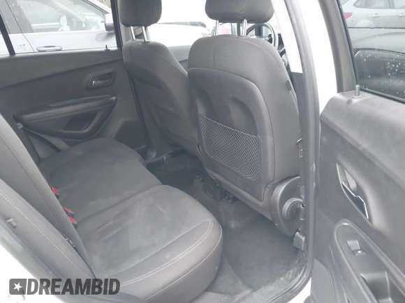 2020 Chevrolet Trax LS with VIN KL7CJKSB8LB074986, listed as a IAAI auction lot 40656872 with 128,582 mi miles and . Bid and sale history available at DreamBid. Image 8.