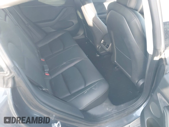 2022 Tesla Model 3 Long Range with VIN 5YJ3E1EB3NF264532, listed as a IAAI auction lot 41842044 with 42,280 mi miles and . Bid and sale history available at DreamBid. Image 8.