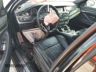 2014 BMW M5 with VIN WBSFV9C54ED097865, listed as a Copart auction lot 79897384 with 0 mi miles and Salvage Title. Bid and sale history available at carsss.com. Image 8.