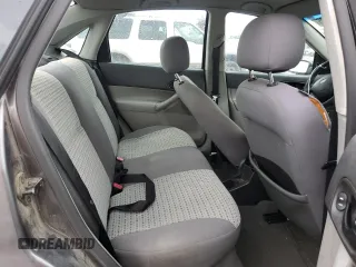 2007 Ford Focus S z VIN 1FAHP34N27W144992, wystawiony jako Copart lot #65571385 z przebiegiem 194 933 mil mil oraz Szkoda całkowita • Salvage title. Historia ofert i sprzedaży dostępna na DreamBid. Obrazek 10.