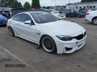 2019 BMW M4 with VIN WBS4Y9C56KAG67136, listed as a IAAI auction lot 42485180 with 73,679 mi miles and . Bid and sale history available at DreamBid. Image 1.