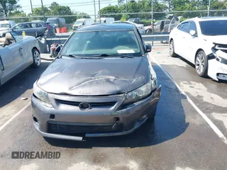 2011 Scion tC z VIN JTKJF5C75B3011644, wystawiony jako IAAI lot #42178185 z przebiegiem 108 187 mil mil oraz . Historia ofert i sprzedaży dostępna na DreamBid. Obrazek 6.