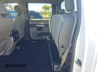 2019 Ford F-150 XL with VIN 1FTFW1E59KKE61191, listed as a IAAI auction lot 42036225 with 99,859 mi miles. Bid and sale history available at carsss.com. Image 1.