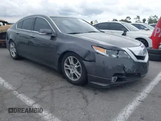 2009 Acura TL Tech with VIN 19UUA86519A014157, listed as a IAAI auction lot 42058423 with 201,403 mi miles. Bid and sale history available at carsss.com. Image 1.