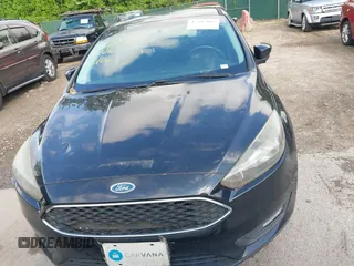 2015 Ford Focus SE with VIN 1FADP3K2XFL319559, listed as a IAAI auction lot 42205107 with 184,499 mi miles. Bid and sale history available at carsss.com. Image 6.