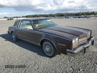 1985 Oldsmobile Toronado Custom Brougham z VIN 1G3EZ57Y6FE321802, wystawiony jako Copart lot #77305454 z przebiegiem 51 559 mil mil oraz Szkody całkowita. Historia ofert i sprzedaży dostępna na DreamBid. Obrazek 4.