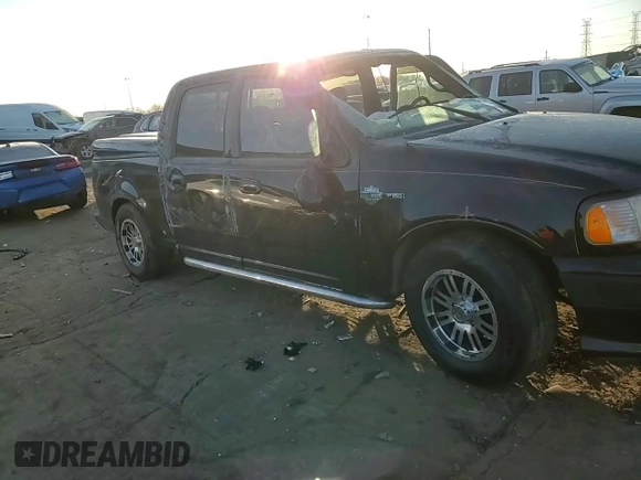 2001 Ford F-150 SuperCrew XLT with VIN 1FTRW07L71KA04123, listed as a Copart auction lot 48477755 with 128,808 mi miles and Clean Title. Bid and sale history available at carsss.com. Image 11.