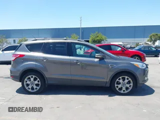 2013 Ford Escape SEL with VIN 1FMCU0HX0DUC16069, listed as a IAAI auction lot 42638924 with 80,200 mi miles and . Bid and sale history available at DreamBid. Image 13.