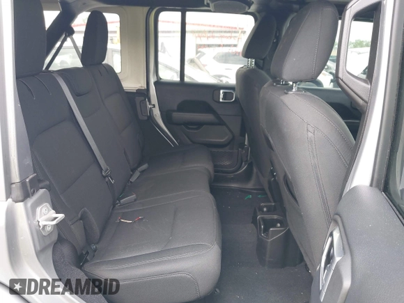 2019 Jeep Wrangler Unlimited Sahara with VIN 1C4HJXEN5KW542403, listed as a IAAI auction lot 42159197 with 60,378 mi miles and . Bid and sale history available at DreamBid. Image 8.