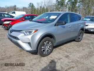 2018 Toyota RAV4 LE with VIN JTMBFREV8JJ224872, listed as a IAAI auction lot 41907962 with 104,605 mi miles and . Bid and sale history available at DreamBid. Image 2.