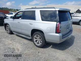 2015 GMC Yukon SLT z VIN 1GKS2BKC0FR100064, wystawiony jako IAAI lot #41941462 z przebiegiem 136 740 mil mil oraz . Historia ofert i sprzedaży dostępna na DreamBid. Obrazek 3.