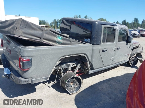 2023 Jeep Gladiator Rubicon with VIN 1C6JJTBG6PL538859, listed as a IAAI auction lot 42633055 with 22,899 mi miles and . Bid and sale history available at DreamBid. Image 4.