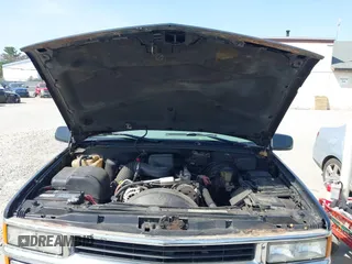 1997 Chevrolet Silverado 1500 with VIN 2GCEK19R3V1159386, listed as a IAAI auction lot 42159684 with 98,577 mi miles and . Bid and sale history available at DreamBid. Image 10.