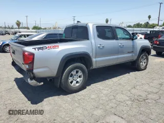 2019 Toyota Tacoma SR with VIN 3TMCZ5AN2KM277551, listed as a Copart auction lot 61586585 with 59,670 mi miles and Salvage title. Bid and sale history available at DreamBid. Image 3.