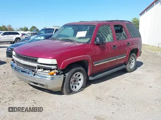 2004 Chevrolet Tahoe LS z VIN 1GNEC13V24R236605, wystawiony jako IAAI lot #41872398 z przebiegiem Nie podano mil oraz . Historia ofert i sprzedaży dostępna na DreamBid. Obrazek 2.