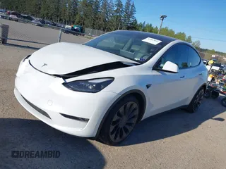 2023 Tesla Model Y Performance with VIN 7SAYGDEF2PF754938, listed as a IAAI auction lot 42067041 with 21,103 mi miles and . Bid and sale history available at DreamBid. Image 19.