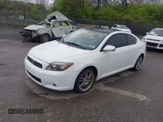 2007 Scion tC Spec with VIN JTKDE177270146530, listed as a IAAI auction lot 42033365 with 128,482 mi miles. Bid and sale history available at carsss.com. Image 2.