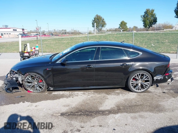 2016 Audi A7 Prestige z VIN WAU2GAFC5GN169534, wystawiony jako IAAI lot #40802384 z przebiegiem 103 263 mil mil oraz . Historia ofert i sprzedaży dostępna na DreamBid. Obrazek 14.