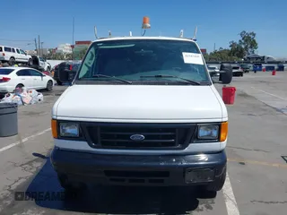 2006 Ford Econoline Cargo with VIN 1FTNE24L66HA64111, listed as a IAAI auction lot 41947445 with 205,025 mi miles and . Bid and sale history available at DreamBid. Image 11.