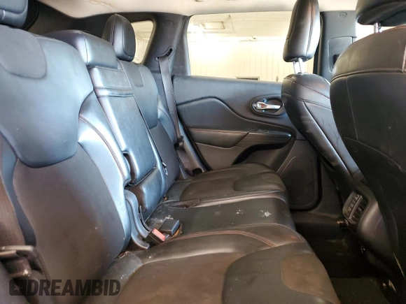 2015 Jeep Cherokee Trailhawk with VIN 1C4PJMBS1FW745928, listed as a Copart auction lot 62032585 with 132,559 mi miles and Salvage title. Bid and sale history available at DreamBid. Image 11.