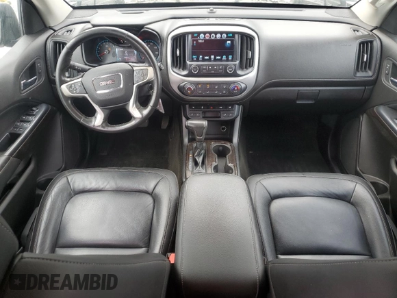 2018 GMC Canyon 4WD SLT with VIN 1GTG6DEN7J1173793, listed as a Copart auction lot 77066714 with 94,137 mi miles and Salvage Title. Bid and sale history available at carsss.com. Image 8.