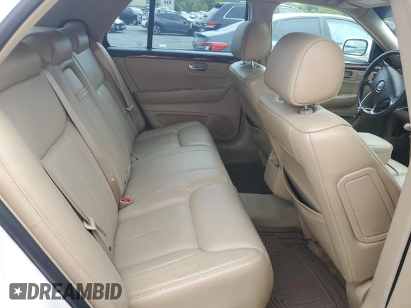 2007 Cadillac DTS V8 z VIN 1G6KD57Y57U215417, wystawiony jako Copart lot #57962455 z przebiegiem 87 592 mil mil oraz Tytuł czysty. Historia ofert i sprzedaży dostępna na DreamBid. Obrazek 10.
