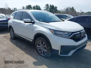 2020 Honda CR-V Touring with VIN 2HKRW2H9XLH623380, listed as a IAAI auction lot 42039028 with 59,795 mi miles and . Bid and sale history available at DreamBid. Image 1.