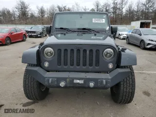 2011 Jeep Wrangler Unlimited Sahara with VIN 1J4HA5H14BL507148, listed as a Copart auction lot 52480325 with 233,835 mi miles and Clean Title. Bid and sale history available at carsss.com. Image 5.