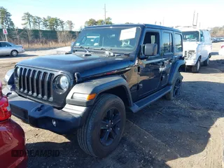 2023 Jeep Wrangler Sport S with VIN 1C4HJXDN6PW617814, listed as a IAAI auction lot 41810646 with 25,095 mi miles and . Bid and sale history available at DreamBid. Image 17.