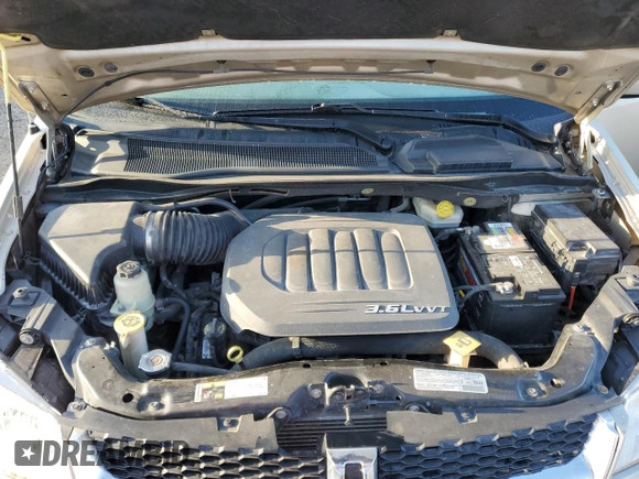 2013 Dodge Grand Caravan Crew with VIN 2C4RDGDG4DR567707, listed as a Copart auction lot 52731005 with 210,359 mi miles and Salvage Title. Bid and sale history available at DreamBid. Image 12.