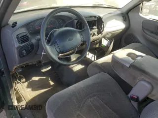 1999 Ford F-150 XL with VIN 2FTZF0720XCA14612, listed as a Copart auction lot 75092304 with 230,897 mi miles and Salvage Title. Bid and sale history available at carsss.com. Image 8.