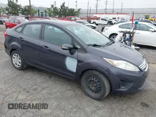 2013 Ford Fiesta SE with VIN 3FADP4BJ0DM199277, listed as a IAAI auction lot 42047833 with 142,739 mi miles. Bid and sale history available at carsss.com. Image 1.