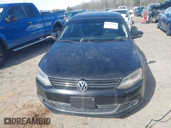 2013 Volkswagen Jetta TDI w/Premium/Nav with VIN 3VWLL7AJ8DM285616, listed as a IAAI auction lot 41597180 with 197,150 mi miles and . Bid and sale history available at DreamBid. Image 6.