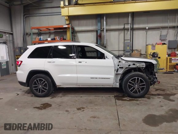 2018 Jeep Grand Cherokee Trailhawk with VIN 1C4RJFLG8JC267810, listed as a IAAI auction lot 41221229 with 108,228 mi miles and . Bid and sale history available at DreamBid. Image 14.