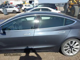 2020 Tesla Model 3 Long Range with VIN 5YJ3E1EB6LF666624, listed as a IAAI auction lot 41720664 with 65,973 mi miles. Bid and sale history available at carsss.com. Image 14.