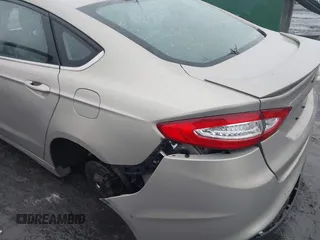 2016 Ford Fusion S with VIN 3FA6P0G78GR138247, listed as a IAAI auction lot 41570370 with 137,922 mi miles. Bid and sale history available at carsss.com. Image 6.
