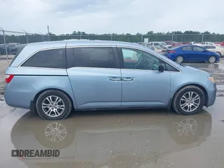 2013 Honda Odyssey EX-L с VIN 5FNRL5H6XDB090432, выставлен на аукционе IAAI как лот 42468409 с пробегом Не указан миль и . История ставок и продаж доступна на DreamBid. Изображение 13.