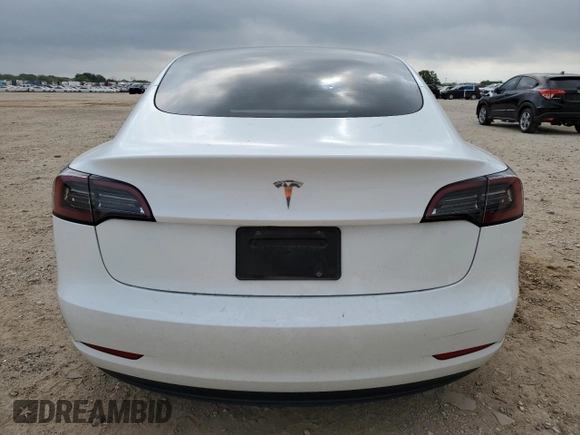 2023 Tesla Model 3 с VIN 5YJ3E1EA1PF600656, выставлен на аукционе Copart как лот 54887235 с пробегом 29 275 миль миль и Списание • Salvage title. История ставок и продаж доступна на DreamBid. Изображение 6.