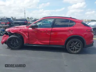 2021 Alfa Romeo Stelvio z VIN ZASPAJAN7M7D08508, wystawiony jako IAAI lot #42206372 z przebiegiem 56 459 mil mil oraz . Historia ofert i sprzedaży dostępna na DreamBid. Obrazek 15.